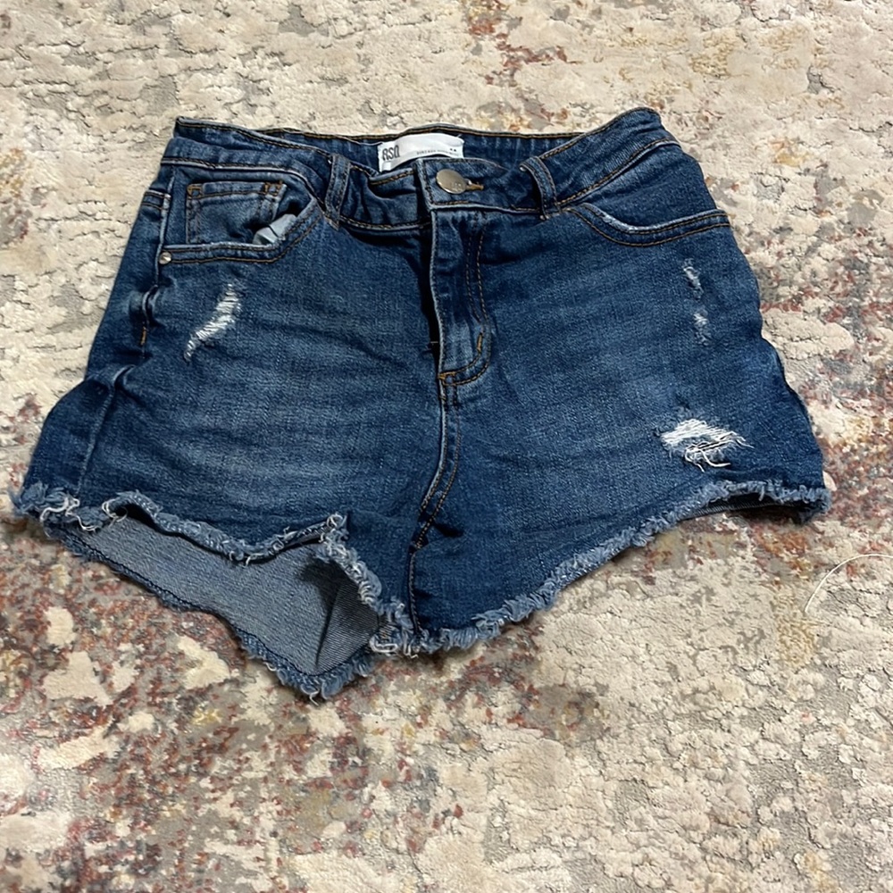Great denim shorts small rips doesn’t show any skin they are perfect